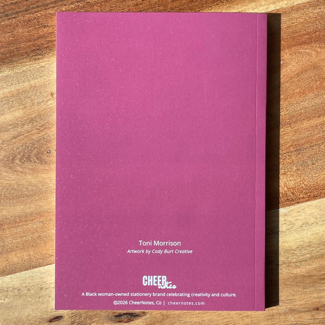 A magenta-purple notebook back showing &
